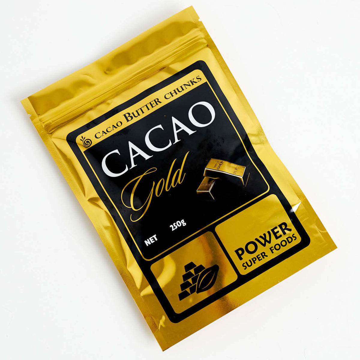 Metallic gold foil stand-up pouch with a black printed Cacao Gold design on a plain white background